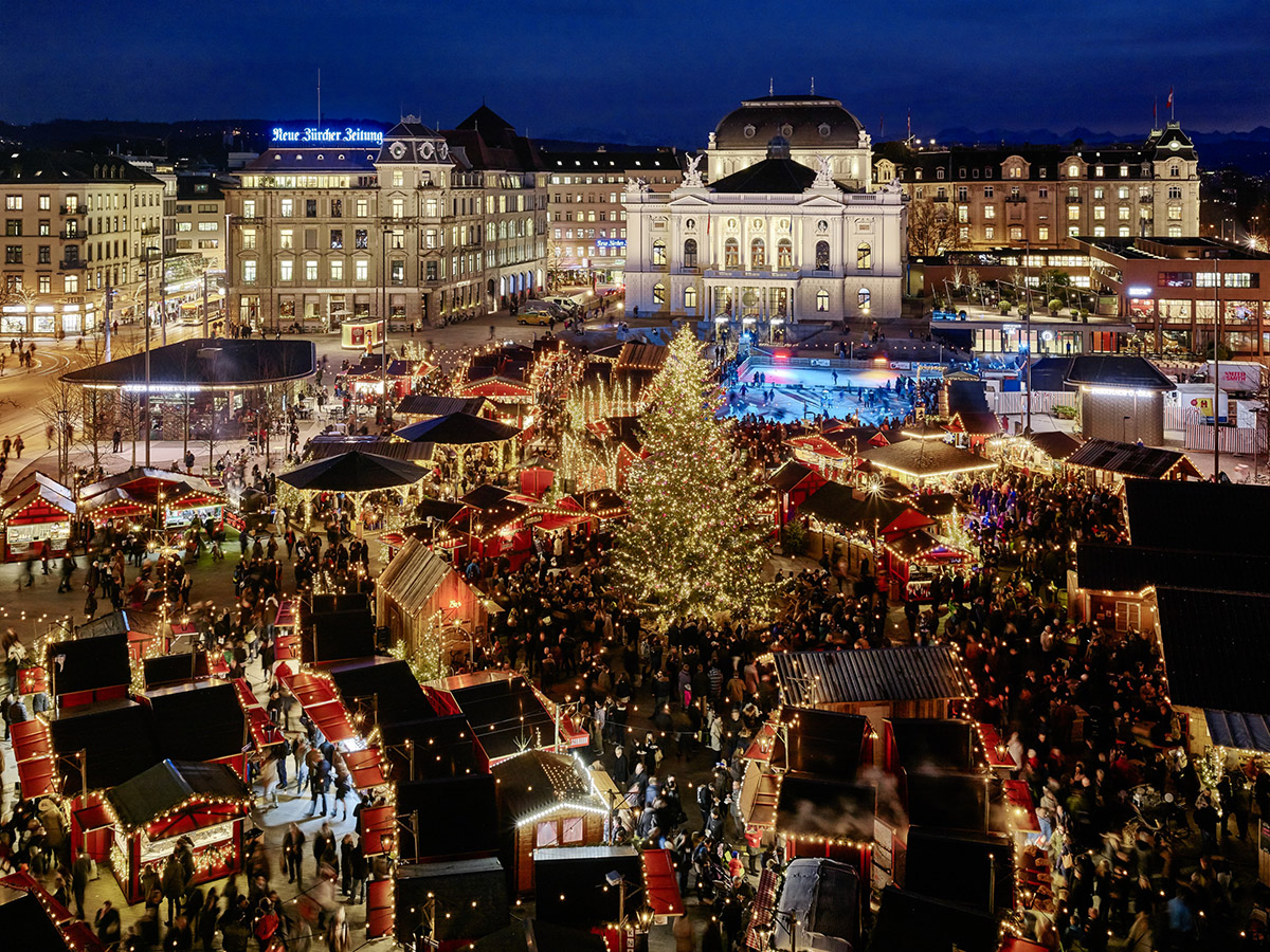 Christmas Village, with 100 market stalls and an ice rink, takes over Sechseläutenplatz in front of the Zurich Opera House. Zurich Tourism