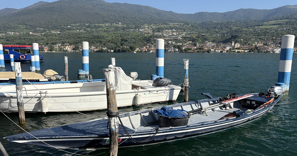 A Naèt, the typical wooden fishing boat for the area, is a lean, agile vessel, with paint colors determining the boat’s village origin. (Alison Ramsey Photo)
