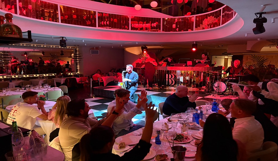 A live band, sultry singers, and glittering dancers present a high-energy show at Pabblo’s dinner seating.