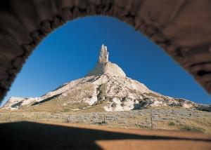 Just like the early settlers, you can view Chimney Rock near Bayard from within a covered wagon as you retrace the Oregon Trail by wagon train.