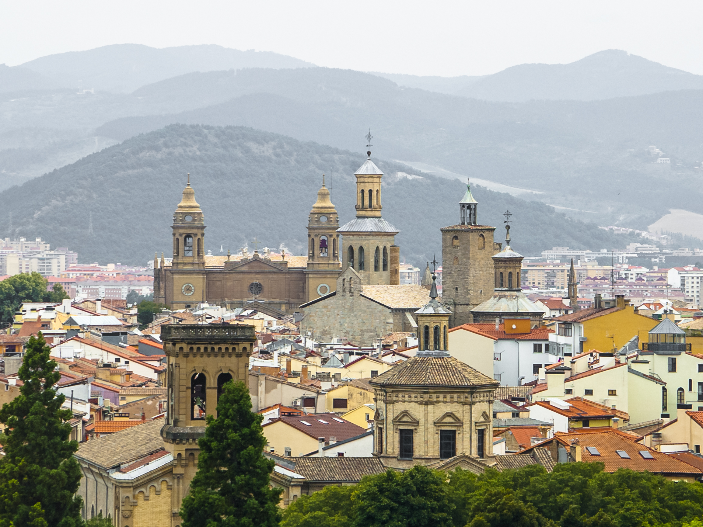 Panoramic view of Pamplona on the background of mountains.