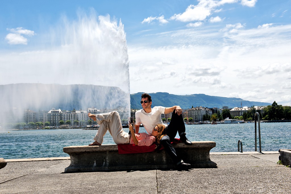 Switzerland. get natural. On the shores of Lake Geneva at the Quai Mont Blanc, the trendy Paquis district, is the place where you can relax excellent. In the background, the symbol of Geneva, the Jet d'Eau (Fountain). Schweiz. ganz natuerlich. Am Ufer des Genfersees am Quai des Mont Blanc im Genfer Trendquartier Paquis laesst es sich vorzueglich ausspannen. Im Hintergrund das Wahrzeichen von Genf, der Jet d'Eau. Suisse. tout naturellement. Sur les rives du lac Leman dans le quartier des Paquis, il peut etre relaxant excellent. Dans le fond, le symbole de Geneve, le Jet d'Eau. Copyright by: Switzerland Tourism - By-Line: swiss-image.ch/Gian Marco Castelberg & Maurice Haas
