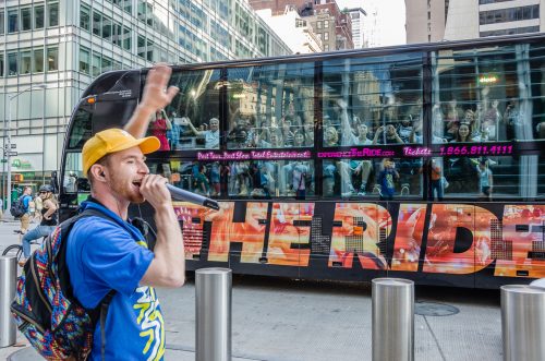 Rappers greet THE RIDE passengers as they journey through Lower Manhattan.
