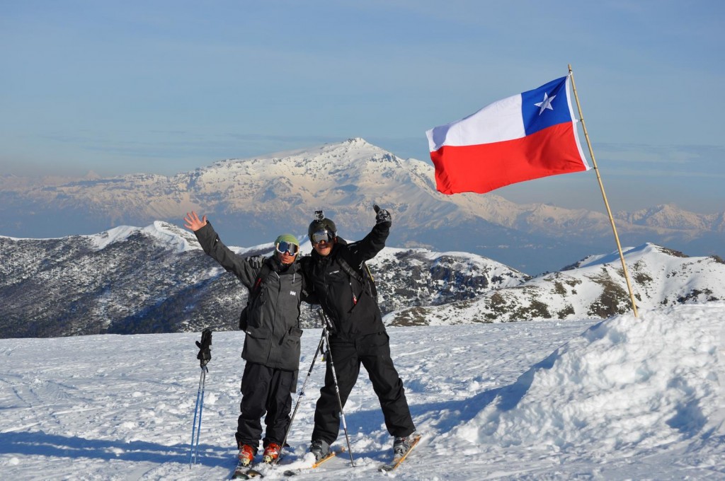 skiers by flag