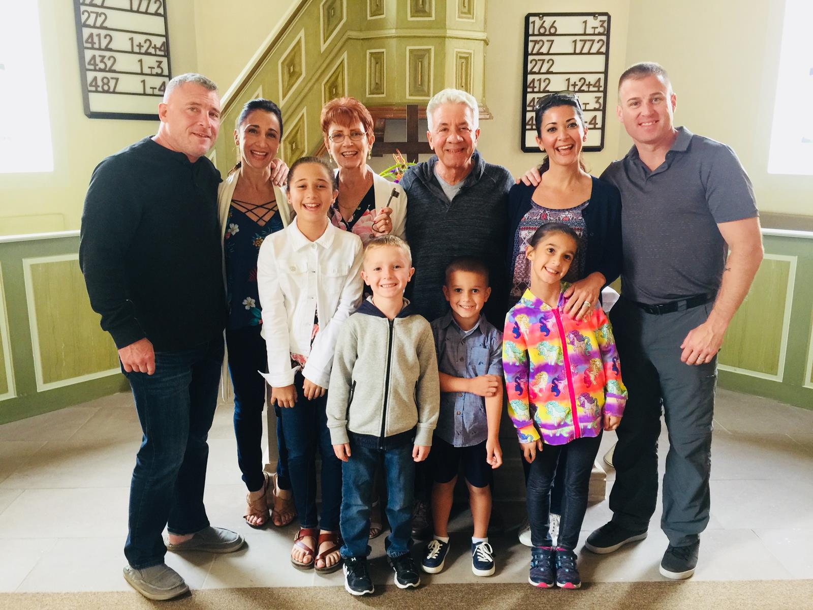 The Petrulli family poses in Lorraine Petrulli’s ancestral church is Essweiler, Germany Photo Credit James Derheim European Focus Private Tours Multigenerational celebration vacations