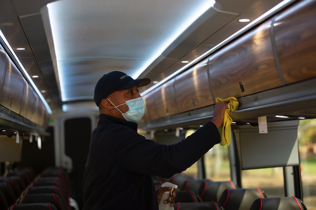 sanitizing the tour bus