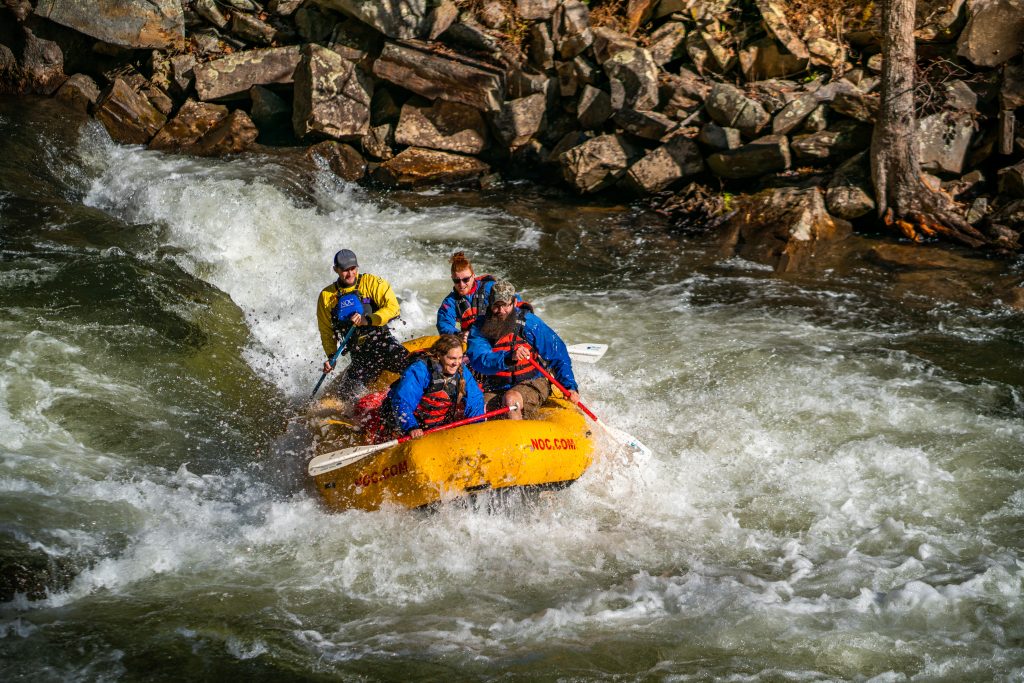 Whitewater Rafting at Nantahala Outdoor Center With Rocks In Background