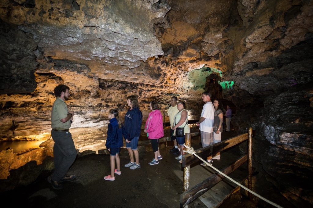 Explore the cave systems like Stark Caverns around Lake of the Ozarks