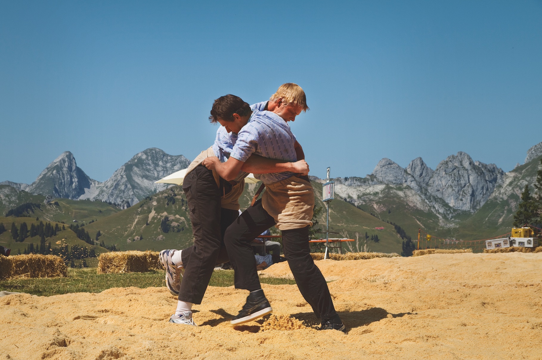 A wrestling festival in the village of Schoenried, near Gstaad in the Bernese Oberland. Switzerland Tourism/Beat Mueller tour reservations