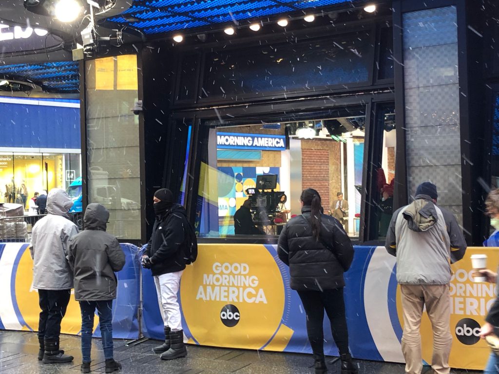 Onlookers can watch the live broadcast of ABC-TV’s “Good Morning America” from the sidewalk on Times Square.