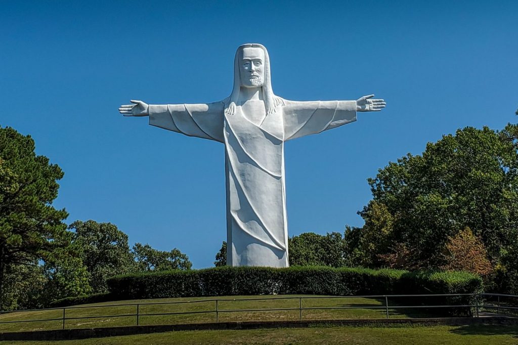 The Christ of the Ozarks statue, measuring 67 feet tall, is visible from the 1886 Crescent Hotel. (Photo credit: Arkansas Tourism)