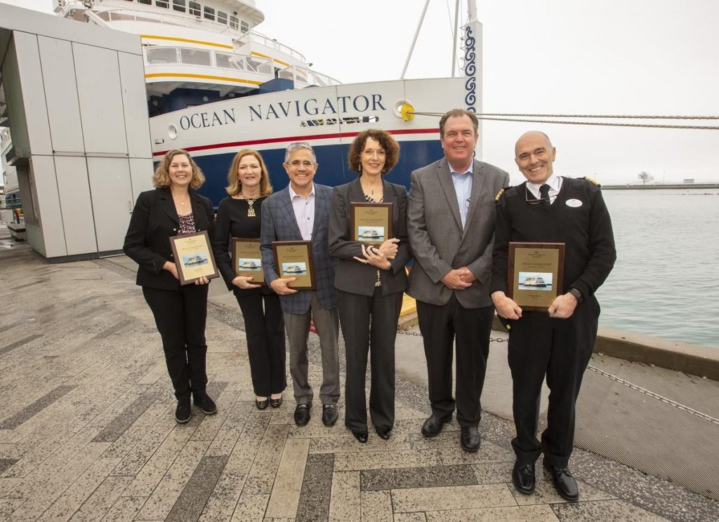 Celebrating the Ocean Navigator’s maiden voyage at Chicago’s Navy Pier were, left to right, Kimberly Bares, Marilynn Gardner, Lynn Osmond, Dan Russell, Bill Annand and Captain Gary Kerr. (Cindy Bertram Photo)