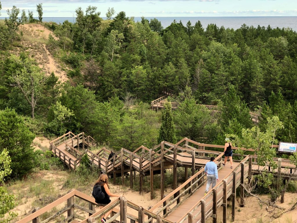 At West Beach in Indiana Dunes National Park, hikers on the Dunes Succession Trail follow a wooden boardwalk through the hills of sand. (Randy Mink Photo)