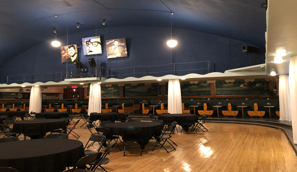 Portraits of Holly, Valens and The Big Bopper, along with the original booth seating overlooks the maple dance floor of the Surf Ballroom in Clear Lake, Iowa. (Randy Mink Photo)
