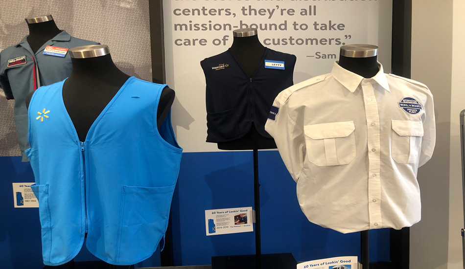 Walmart uniforms on display help tell the retailer’s story at the Walmart Museum Heritage Lab in Bentonville, Arkansas. (Randy Mink Photo)