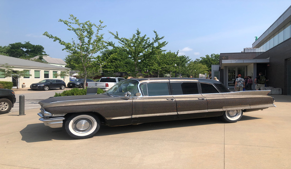 Featuring a 1962 Cadillac Fleetwood limousine covered in thousands of coins, this public artwork by Monica Mahoney sits outside the entrance to Bentonville’s 21c Museum Hotel. (Randy Mink Photo)