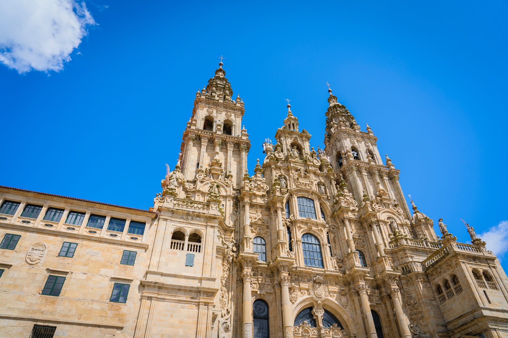 Santiago de Compostela cathedral under a blue sky, Praza do Obradoiro, Spain