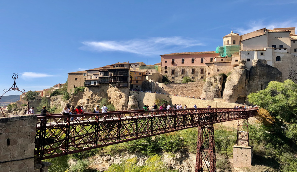 Crossing the San Pablo footbridge, which spans the Huécar River gorge, is a prime tourist activity in Cuenca.