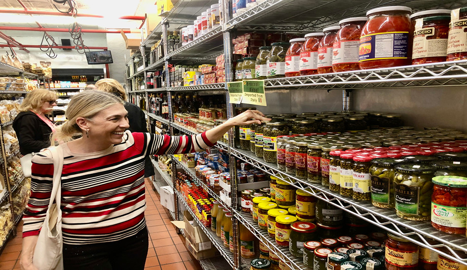 Chef Jacquie, owner of StrEATS of Philly, takes her guests on lively walking tours to the eateries and food stores of South Philadelphia’s historic Italian Market. She is shown here in Claudio’s Specialty Foods. (Randy Mink Photo)