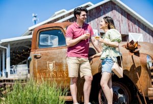 043 Couple Enjoying Wine at Baileys Run Vineyard and Winery in New Glarus