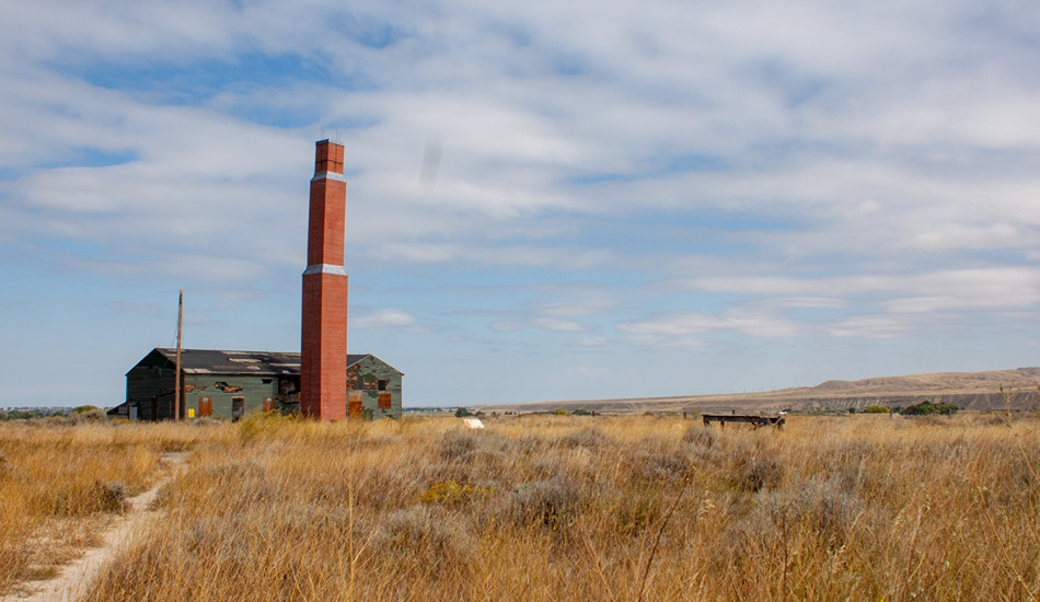 The chimney of the Heart Mountain hospital complex can be seen for miles around. (Photo credit: Wyoming Office of Tourism)