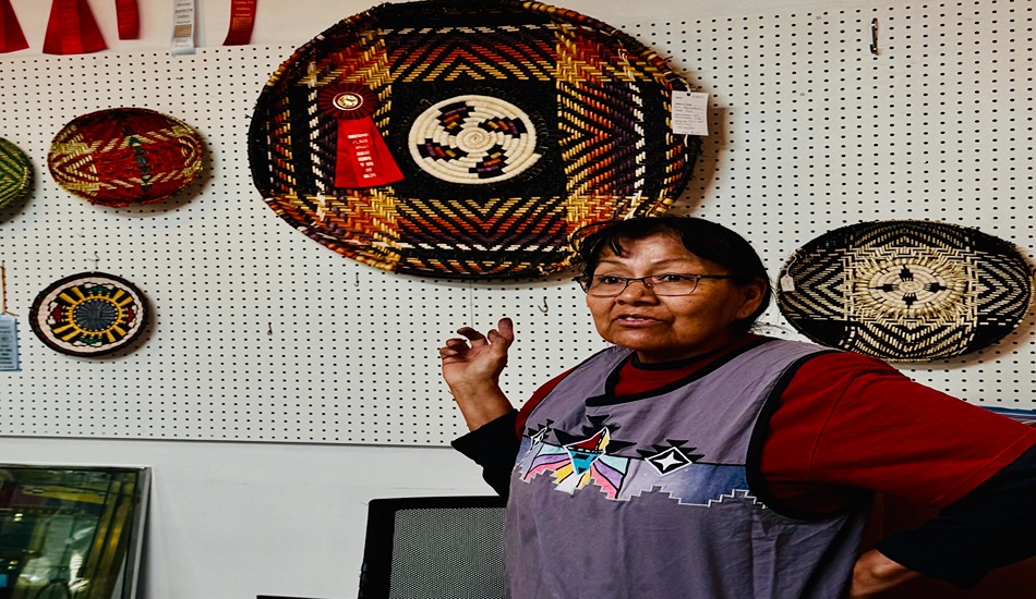 Hopi basket maker Ivy Honyestewa at Iskasokpu Gallery. (Randy Mink Photo)