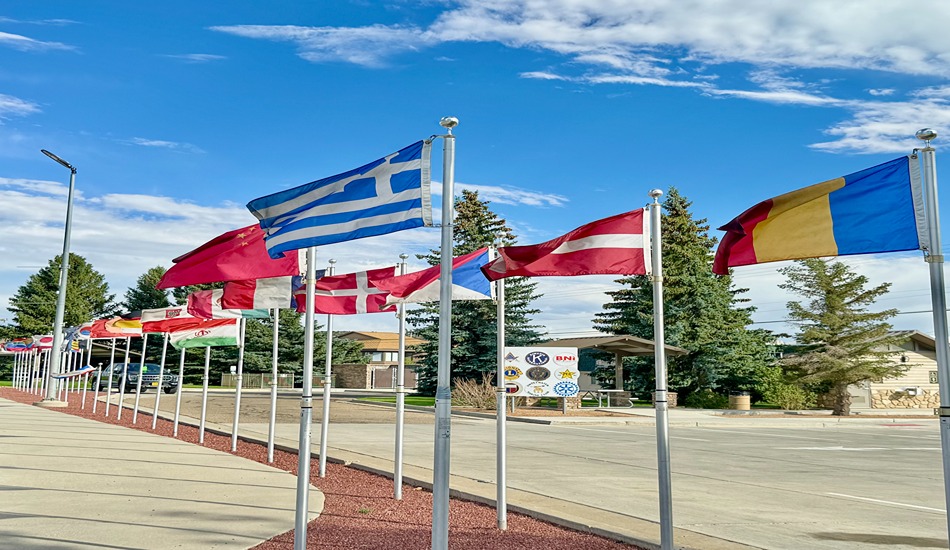 Flags of many lands lend a festive touch to one of Rock Springs’ main roads. (Randy Mink Photo)